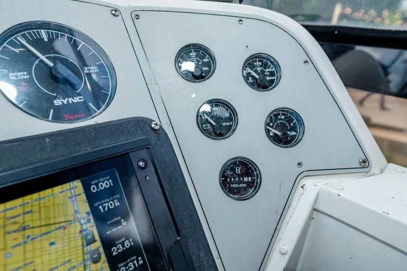 Bada Bing Yacht Photos Pics 1991 Cruisers Yachts 3850 Aft Cabin dashboard with gauges and navigation display.