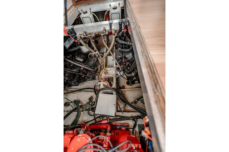 Bada Bing Yacht Photos Pics Engine compartment of 1991 Cruisers Yachts 3850 Aft Cabin, showcasing mechanical components.