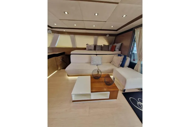 Grace Yacht Photos Pics Luxurious interior of 2013 Sunreef 60 LOFT yacht with modern seating and decor.