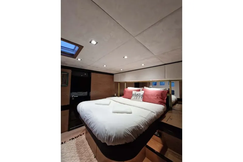 Grace Yacht Photos Pics Luxurious bedroom interior of 2013 Sunreef 60 LOFT yacht with modern design and cozy bedding.