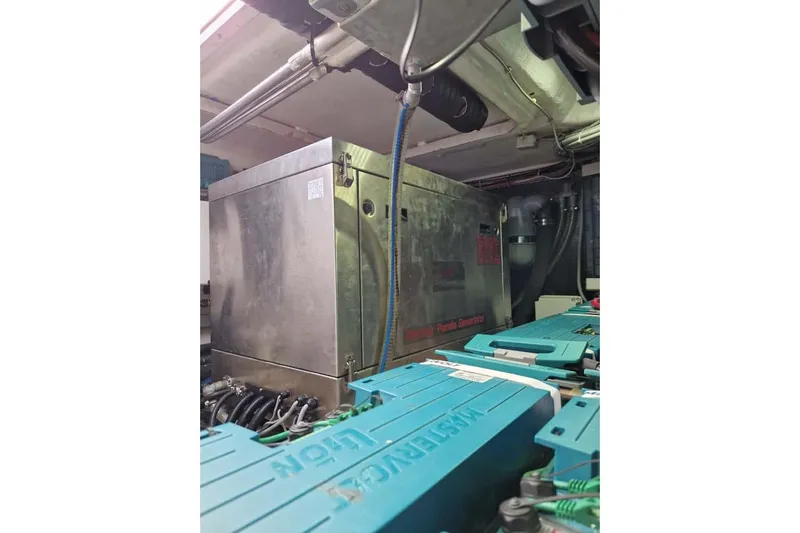 Grace Yacht Photos Pics Engine room of 2013 Sunreef 60 LOFT yacht with generator and equipment.