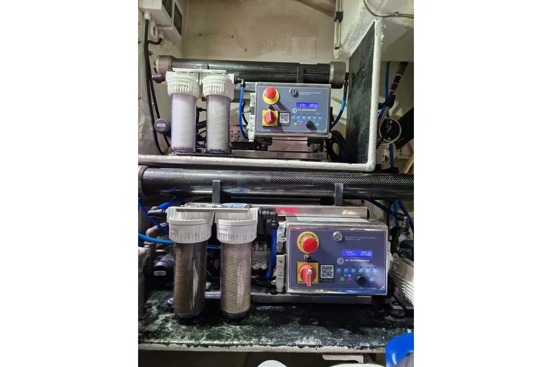 Grace Yacht Photos Pics Engine room of 2013 Sunreef 60 LOFT yacht with filtration system and control panels.