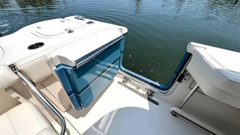  Yacht Photos Pics 2019 Grady-White Freedom 325 boat with open side door, showing water access.