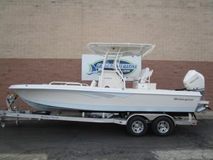 2024 Ranger 2360 Bay boat on a trailer at a marina.