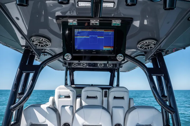  Yacht Photos Pics 2026 Barker Boatworks 40HPC interior with advanced navigation system and luxurious seating.