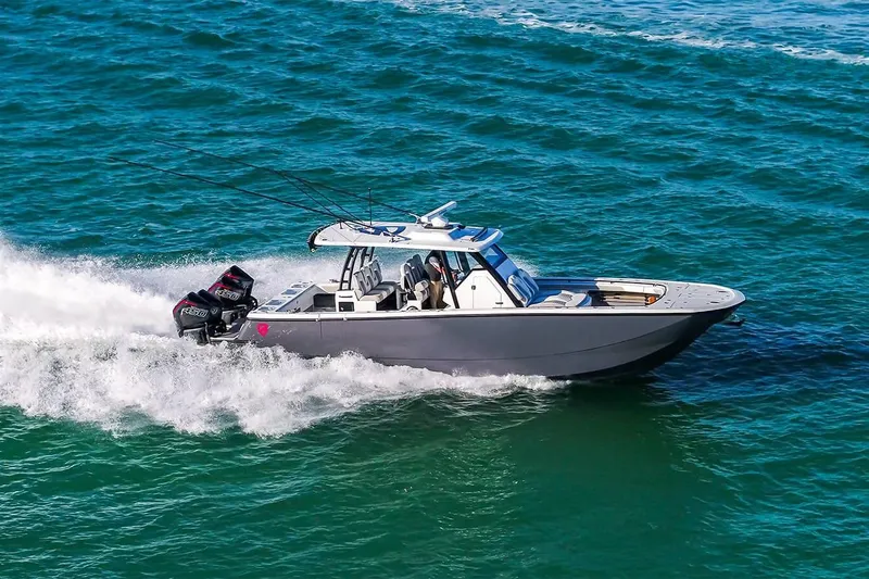  Yacht Photos Pics 2026 Barker Boatworks 40HPC cruising swiftly on open water.