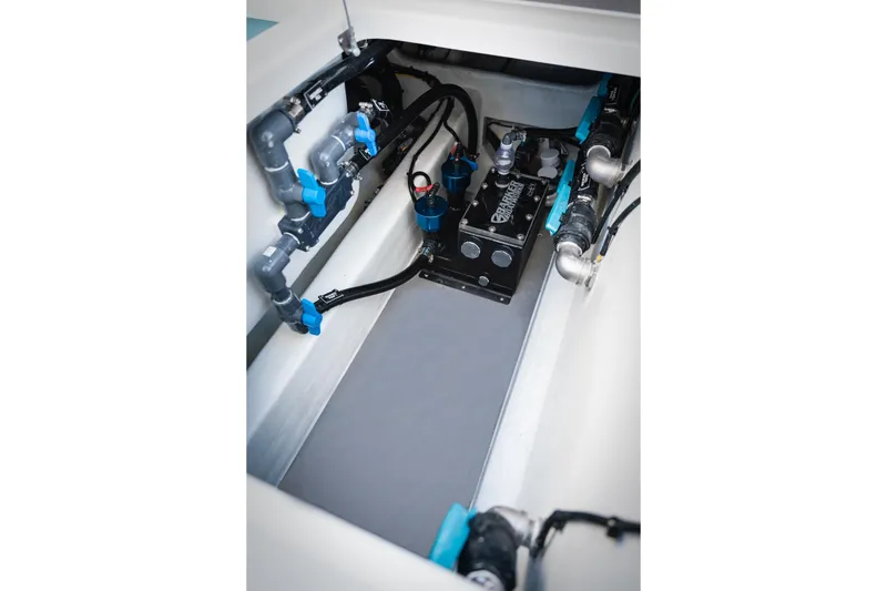  Yacht Photos Pics 2026 Barker Boatworks 40HPC engine compartment with advanced plumbing and mechanical systems.