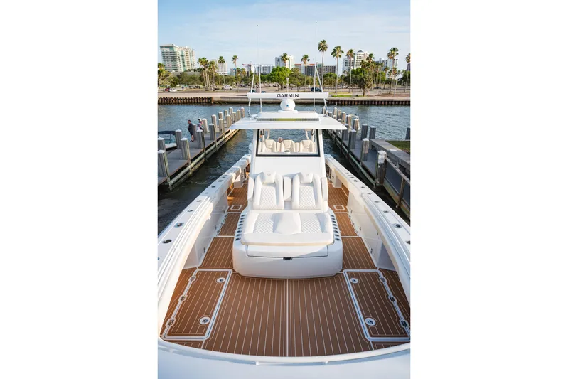  Yacht Photos Pics 2026 Barker Boatworks 40HPC with sleek deck design, docked by waterfront.