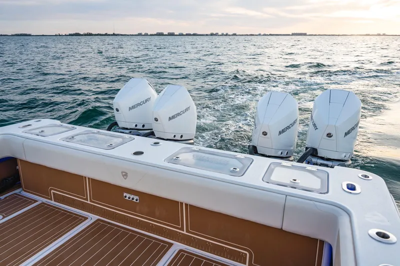  Yacht Photos Pics 2026 Barker Boatworks 40HPC with four Mercury engines on open water.