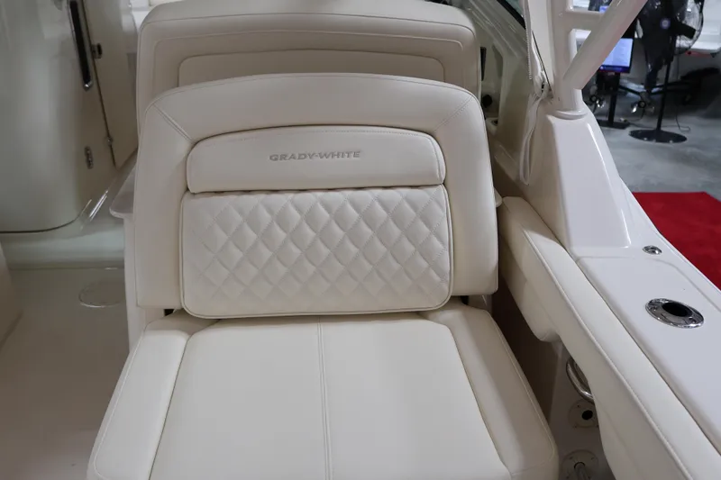  Yacht Photos Pics 2026 Grady-White Freedom 325 boat seat with quilted white upholstery.