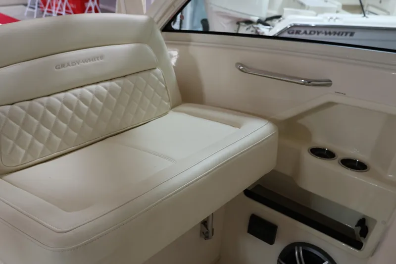  Yacht Photos Pics 2026 Grady-White Freedom 325 boat interior with luxurious seating and cup holders.