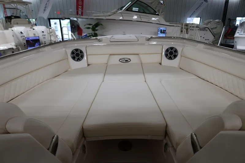  Yacht Photos Pics 2026 Grady-White Freedom 325 boat interior with cushioned seating in showroom.