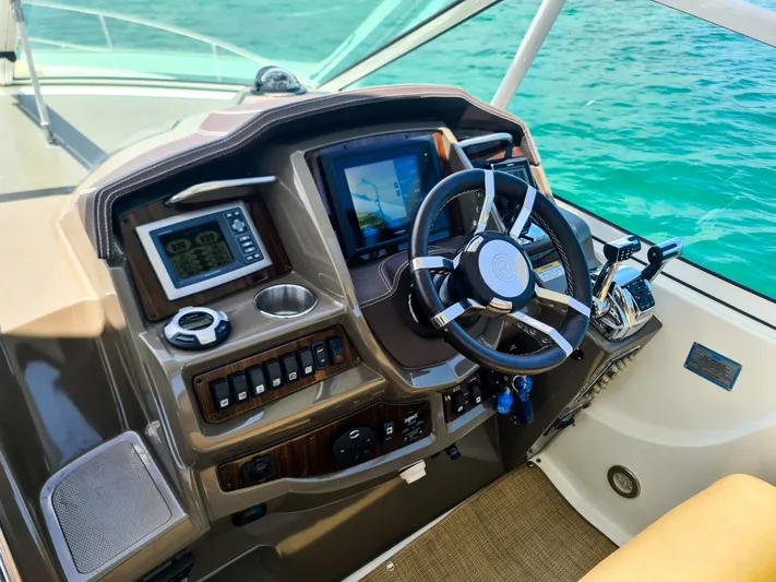 2015 Cruisers Yachts 350 Express Yacht Photos Pics 2015 Cruisers Yachts 350 Express helm with modern controls and ocean view.