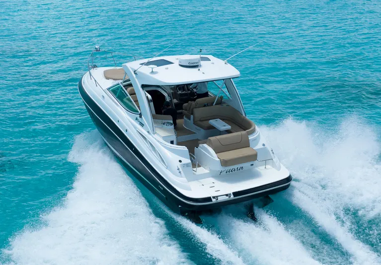 2015 Cruisers Yachts 350 Express Yacht Photos Pics 2015 Cruisers Yachts 350 Express cruising on clear blue water.