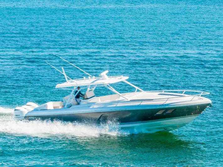  Yacht Photos Pics 2016 Intrepid 400 Cuddy cruising on open water.