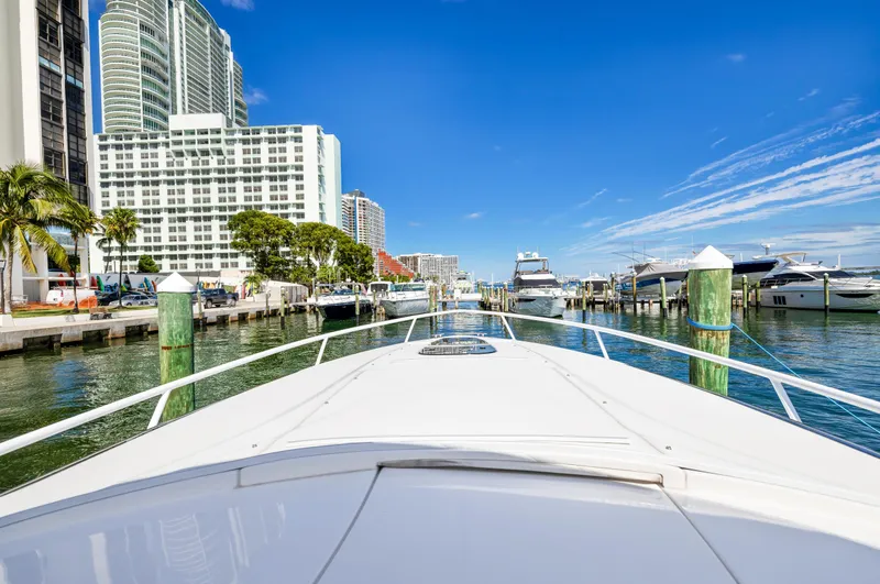  Yacht Photos Pics View from the bow of a 2016 Intrepid 400 Cuddy yacht in a marina.