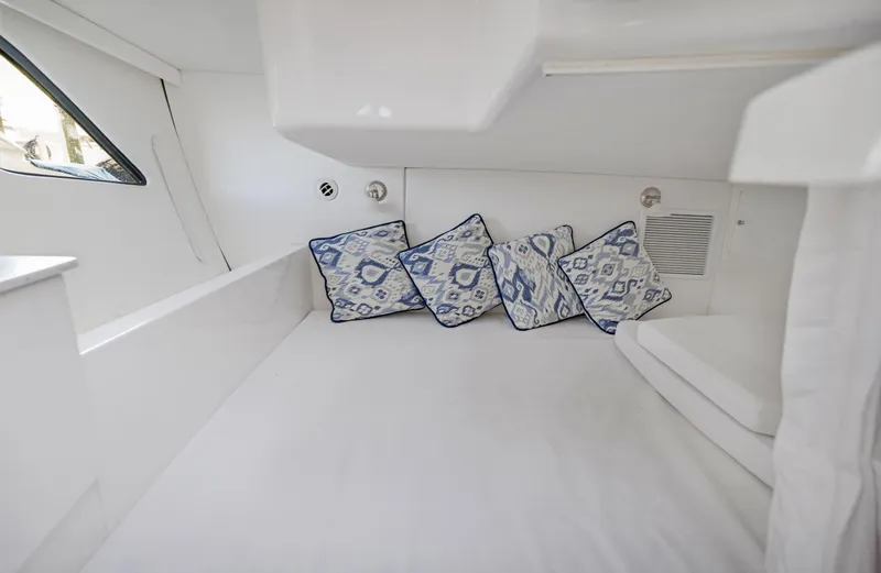  Yacht Photos Pics Interior cabin of 2016 Intrepid 400 Cuddy with patterned cushions.