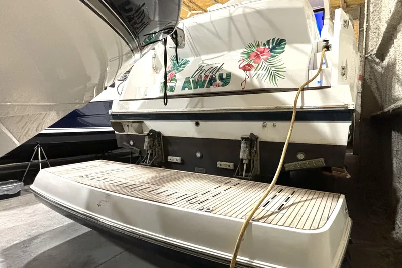  Yacht Photos Pics 2015 Beneteau Gran Turismo 49 yacht in storage, featuring tropical-themed rear design.