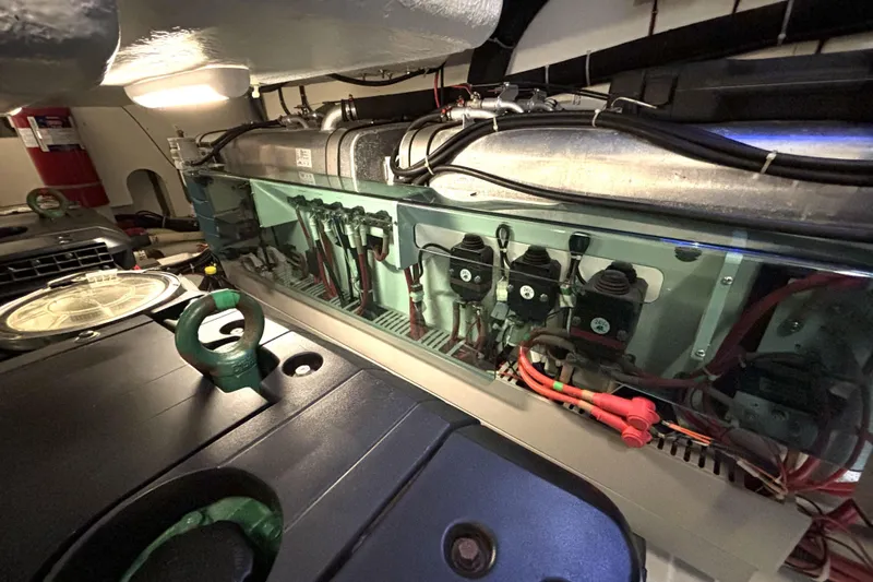  Yacht Photos Pics Engine room of 2015 Beneteau Gran Turismo 49 yacht, showcasing mechanical components.