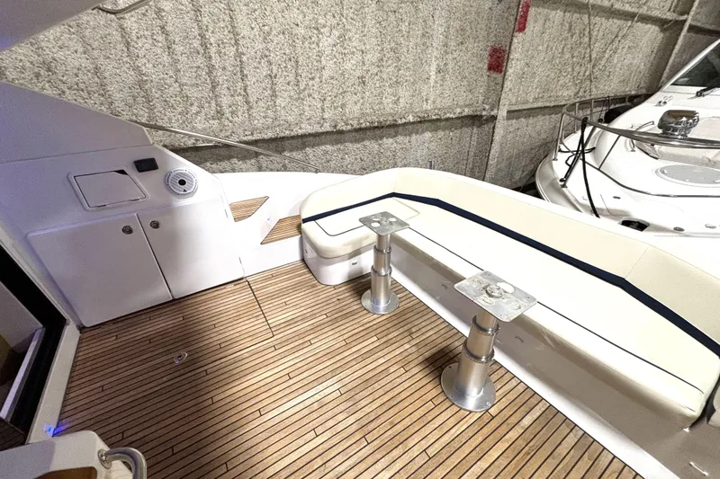  Yacht Photos Pics 2015 Beneteau Gran Turismo 49 yacht deck with seating and wood flooring.