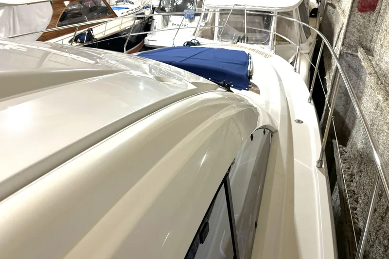  Yacht Photos Pics 2015 Beneteau Gran Turismo 49 yacht docked, showcasing sleek design and polished exterior.