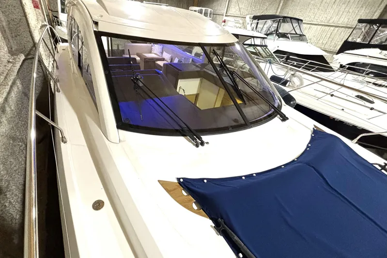  Yacht Photos Pics 2015 Beneteau Gran Turismo 49 yacht in storage, showcasing sleek design and spacious interior.