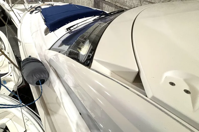  Yacht Photos Pics 2015 Beneteau Gran Turismo 49 yacht, sleek design, docked with blue cover.