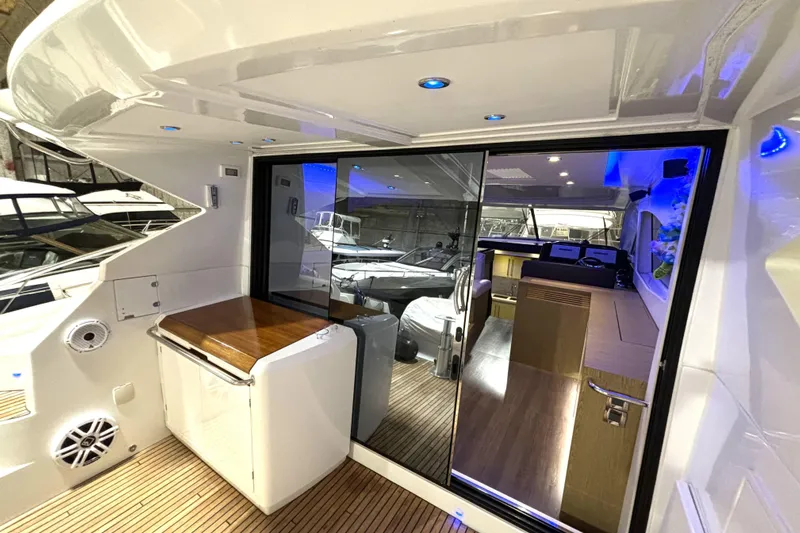  Yacht Photos Pics 2015 Beneteau Gran Turismo 49 yacht interior with modern design and ambient lighting.