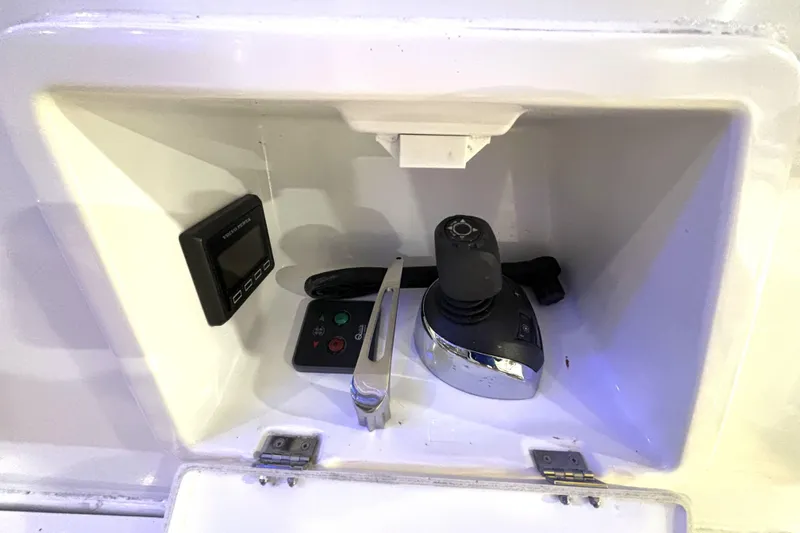  Yacht Photos Pics Control panel of 2015 Beneteau Gran Turismo 49 yacht, featuring joystick and display.