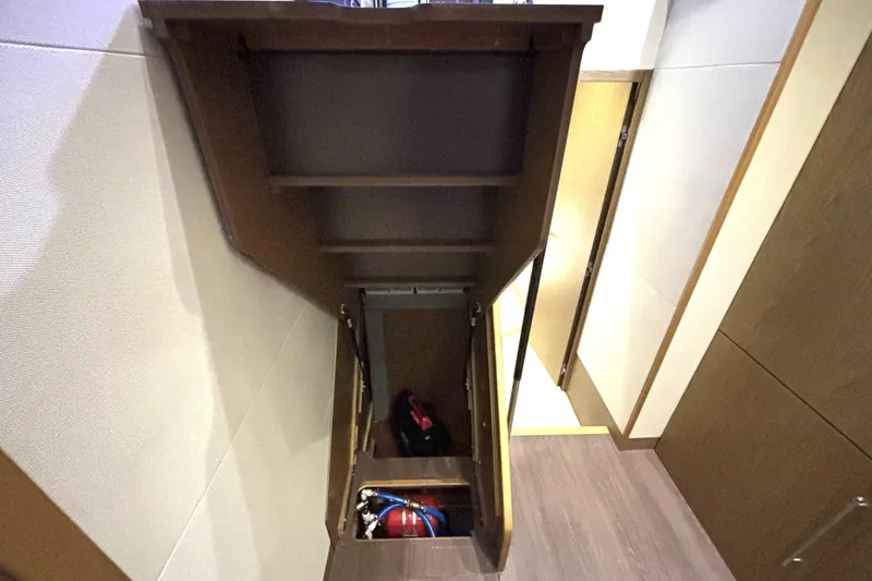  Yacht Photos Pics Interior view of 2015 Beneteau Gran Turismo 49 yacht, featuring a storage compartment.