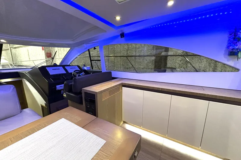  Yacht Photos Pics Interior of 2015 Beneteau Gran Turismo 49 yacht with modern design and blue LED lighting.