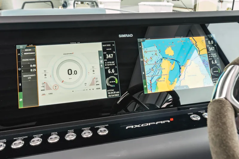 Egret Yacht Photos Pics 2023 Axopar 37 dashboard with Simrad navigation and engine display screens.