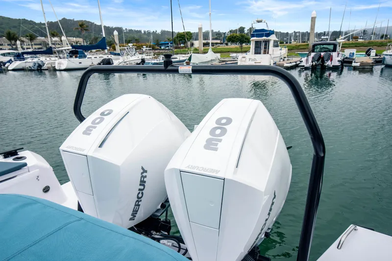 Egret Yacht Photos Pics 2023 Axopar 37 with twin Mercury 300 engines docked at a marina.