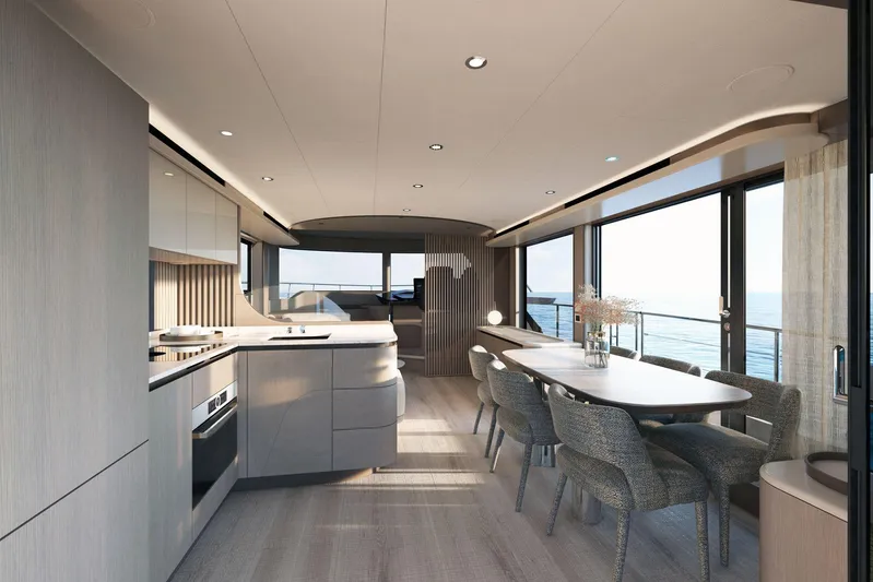 Absolute Navetta 58 Yacht Photos Pics Luxurious interior of 2026 Absolute NAVETTA 58 yacht with modern dining and kitchen area.