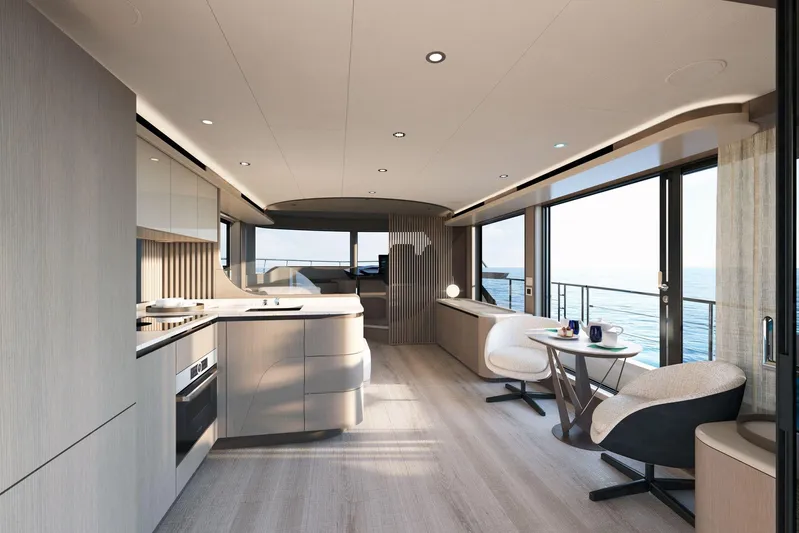 Absolute Navetta 58 Yacht Photos Pics Luxurious interior of 2026 Absolute NAVETTA 58 yacht with modern kitchen and ocean view.