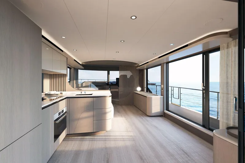Absolute Navetta 58 Yacht Photos Pics Luxurious interior of 2026 Absolute NAVETTA 58 yacht with modern kitchen and ocean view.