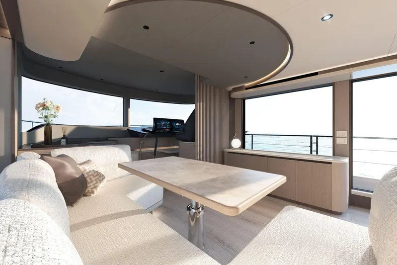 Absolute Navetta 58 Yacht Photos Pics Luxurious interior of 2026 Absolute NAVETTA 58 yacht with elegant seating and ocean view.