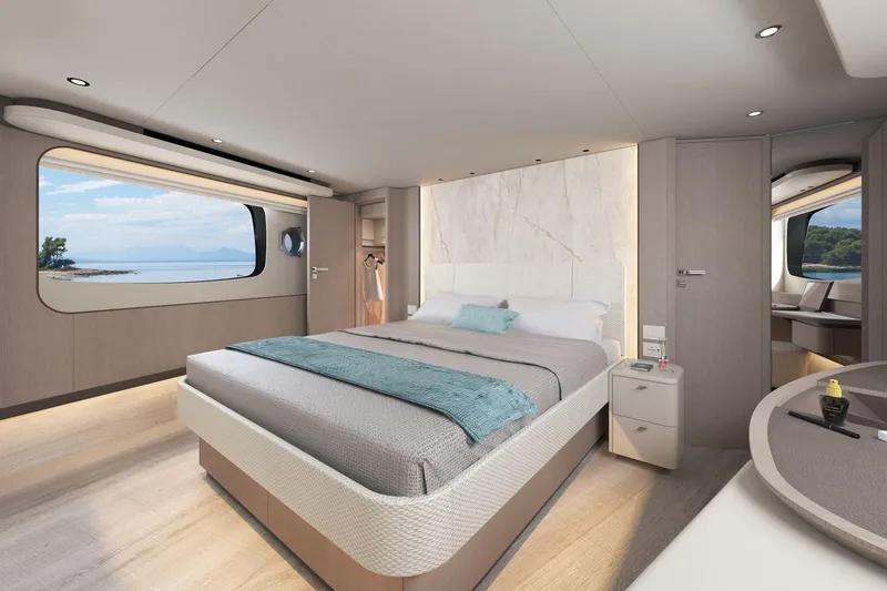 Absolute Navetta 58 Yacht Photos Pics Luxurious bedroom interior of 2026 Absolute NAVETTA 58 yacht with ocean view.