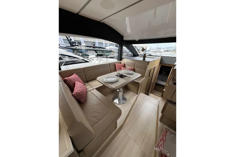 Sealine F430 Yacht Photos Pics Luxurious interior of 2020 Sealine F430 yacht with elegant seating and dining area.