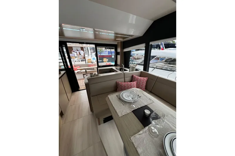 Sealine F430 Yacht Photos Pics Interior of 2020 Sealine F430 yacht with elegant dining area and modern decor.