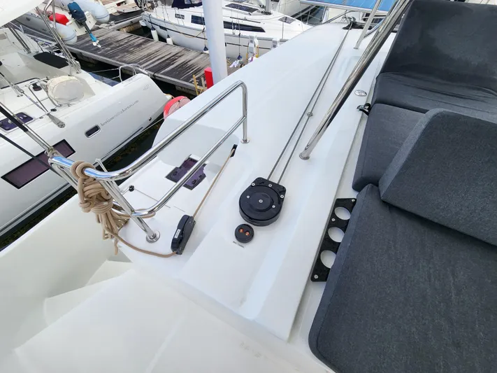 Echo Yacht Photos Pics 2023 Lagoon 50 yacht deck with seating and rigging details.