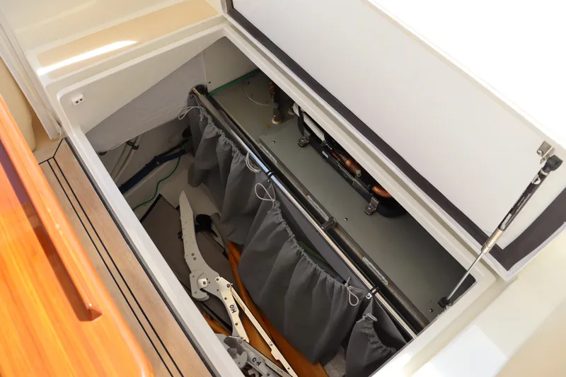 Rambler VIII Yacht Photos Pics Storage compartment of 2013 MJM 36z Downeast boat, featuring organized equipment and accessories.