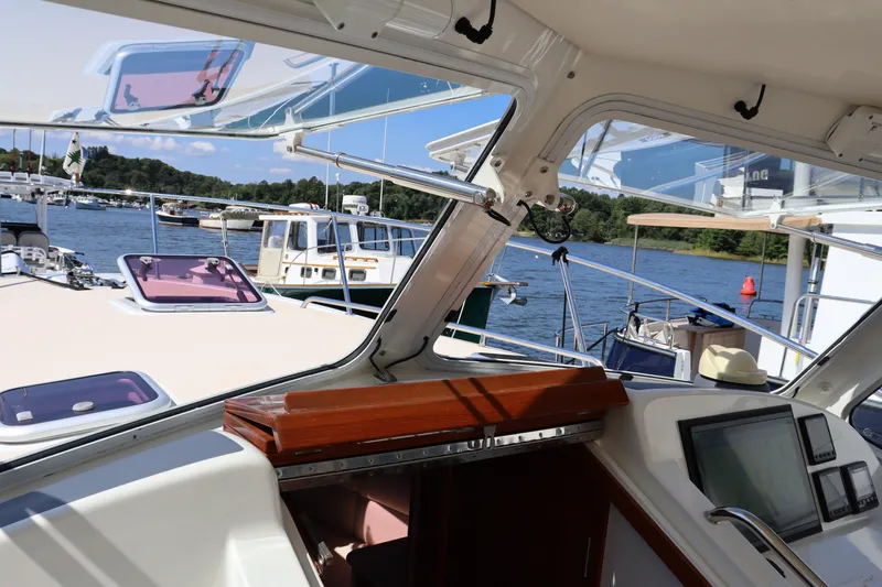 Rambler VIII Yacht Photos Pics Interior view of 2013 MJM 36z Downeast boat with scenic marina background.