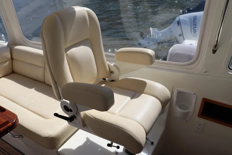 Rambler VIII Yacht Photos Pics Luxurious seating on 2013 MJM 36z Downeast boat with water view.