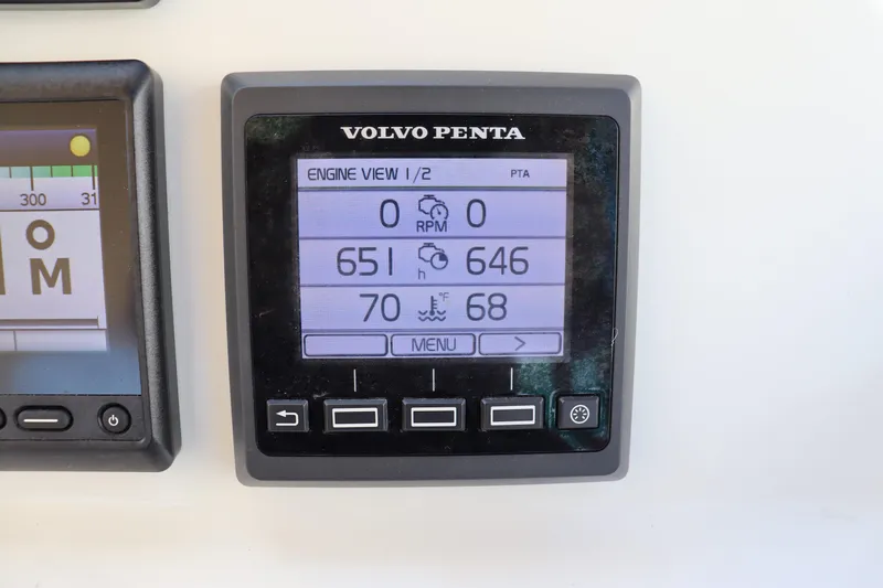 Rambler VIII Yacht Photos Pics Volvo Penta engine display on 2013 MJM 36z Downeast boat dashboard.