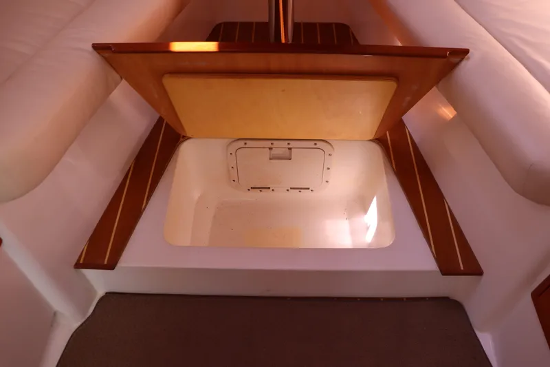 Rambler VIII Yacht Photos Pics 2013 MJM 36z Downeast boat interior with open storage compartment.
