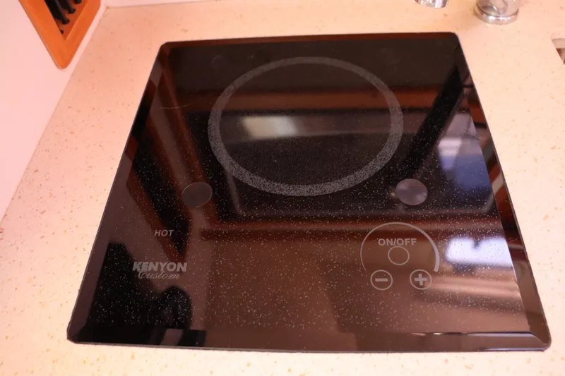 Rambler VIII Yacht Photos Pics Kenyon electric cooktop on 2013 MJM 36z Downeast yacht kitchen counter.