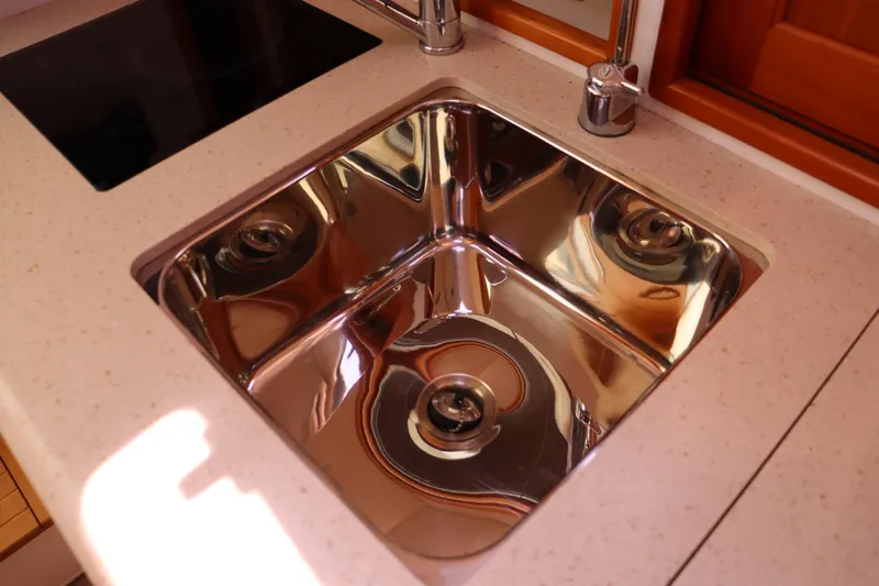 Rambler VIII Yacht Photos Pics Stainless steel sink in 2013 MJM 36z Downeast yacht kitchen.