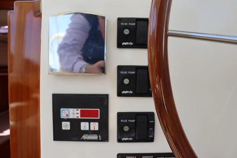 Rambler VIII Yacht Photos Pics Control panel of 2013 MJM 36z Downeast boat with switches and gauges.