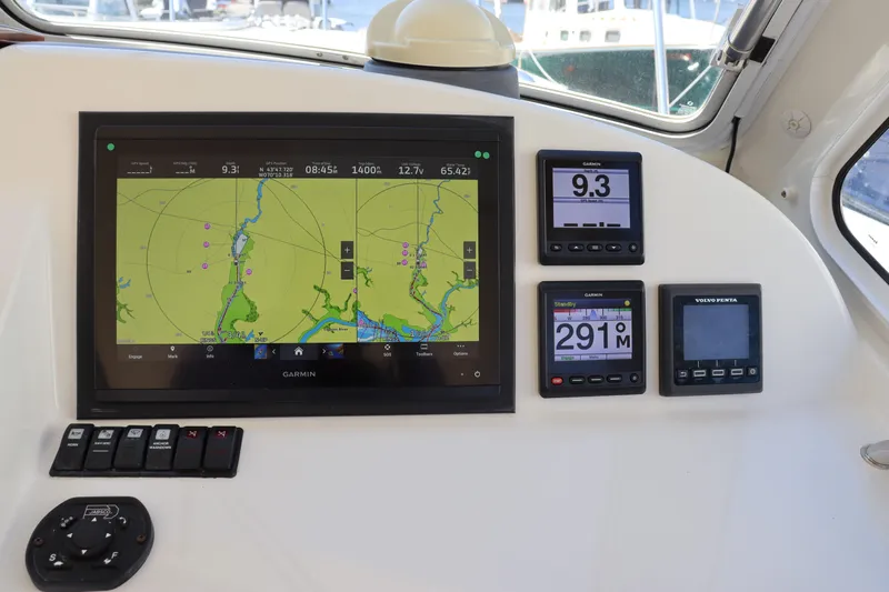 Rambler VIII Yacht Photos Pics Boat navigation system on 2013 MJM 36z Downeast with digital displays and controls.